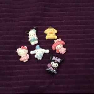 Sanrio pastel character mini fridge magnets — pink, white, yellow, black